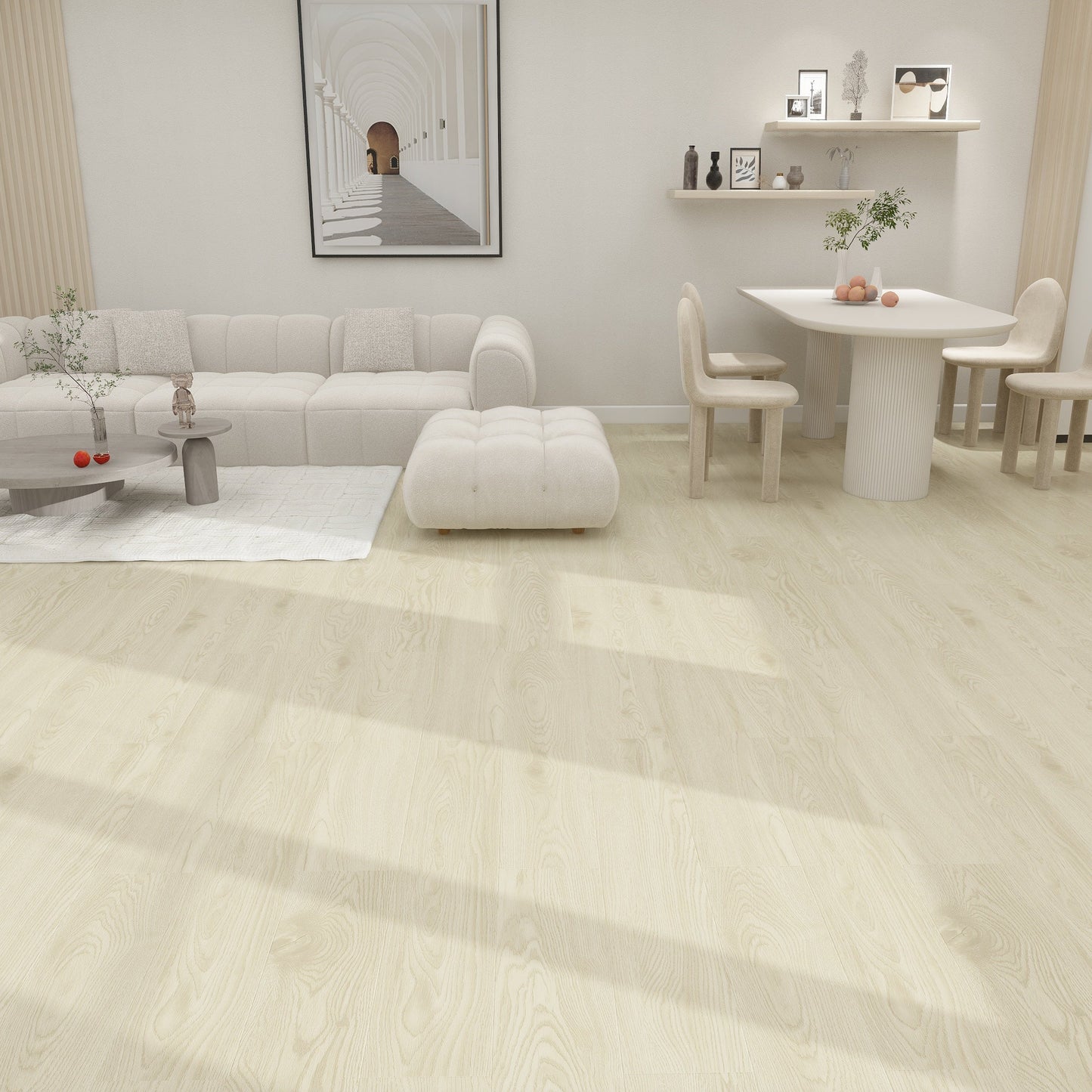 Modern living room with light wood flooring, furniture, and decor.