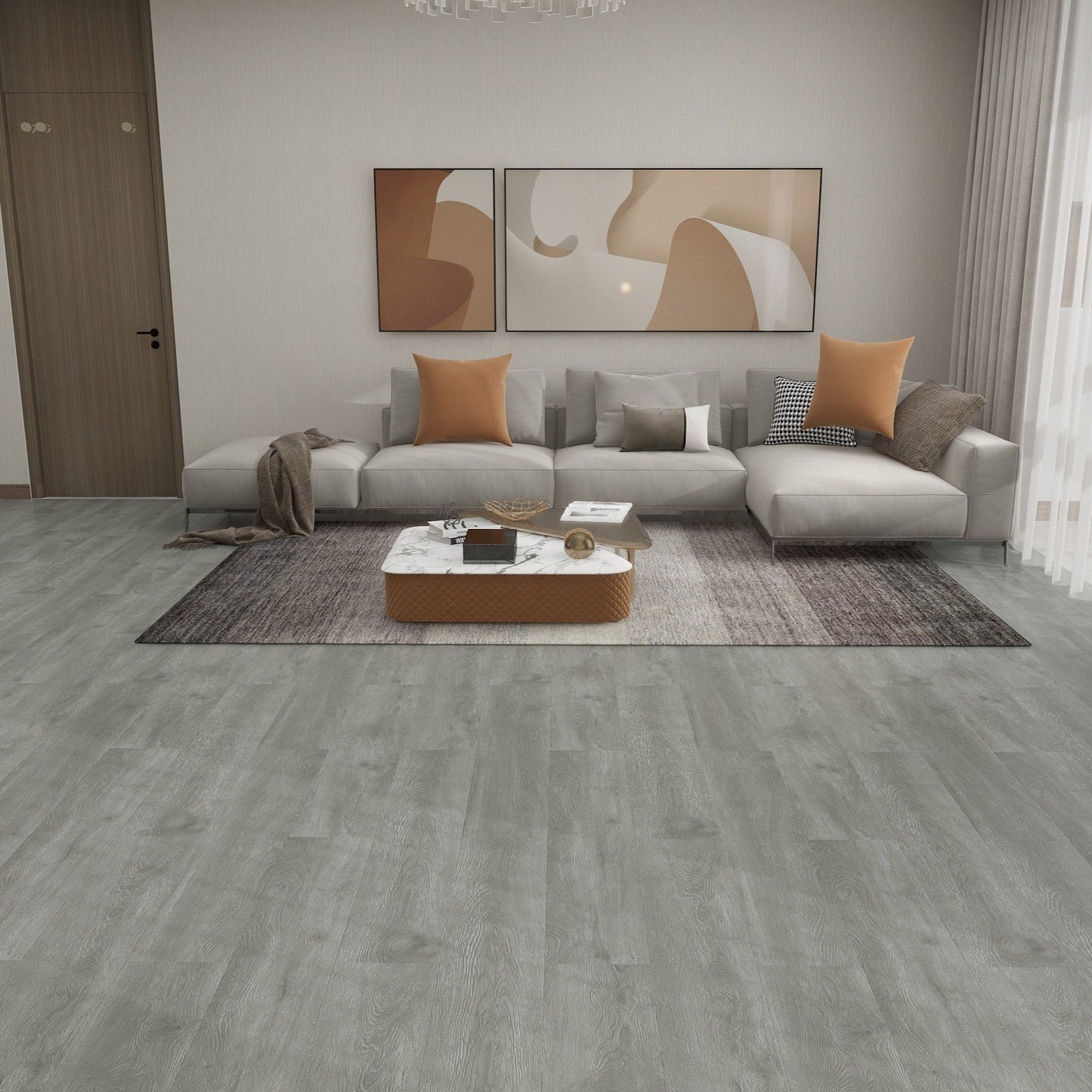 Modern living room with gray sofa, coffee table, and decorative elements.