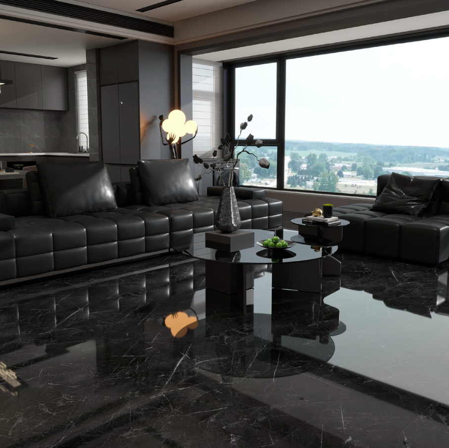 Modern black leather sofa in a stylish living room with large windows.