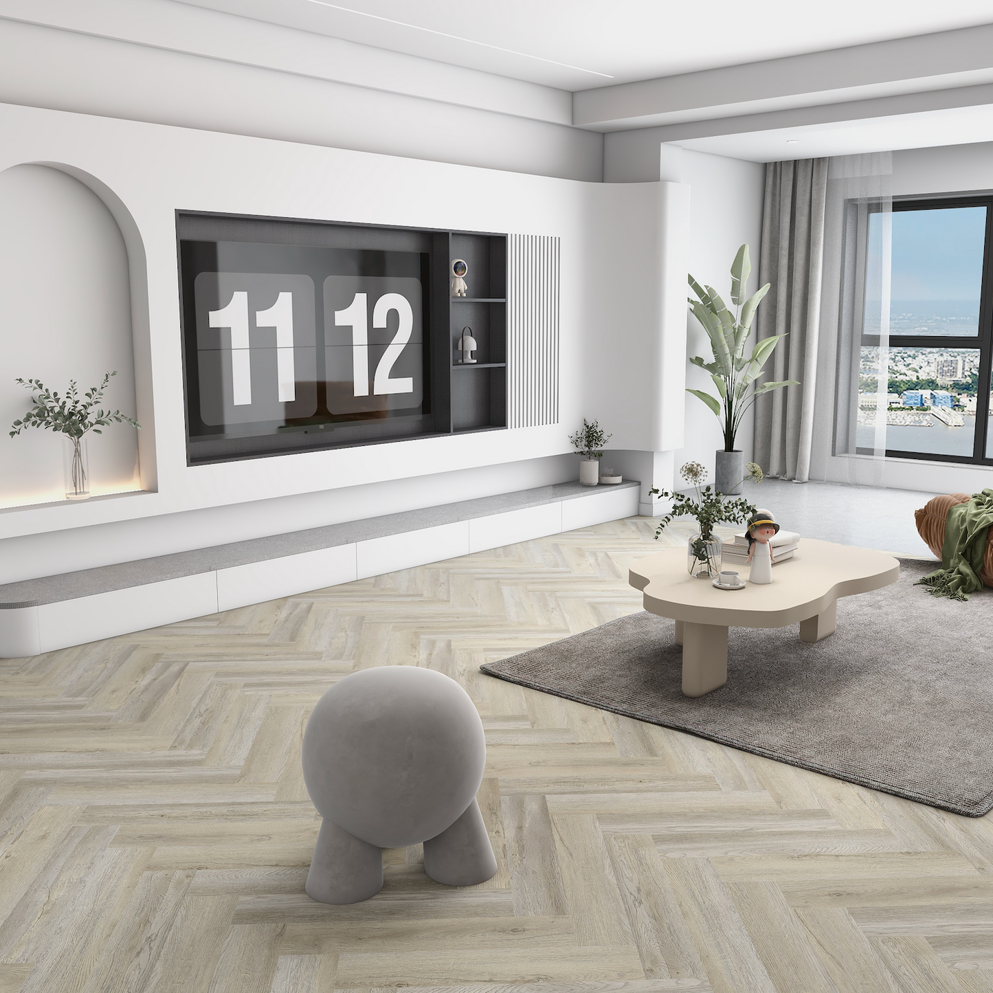 Modern living room with a TV, coffee table, and decorative items.