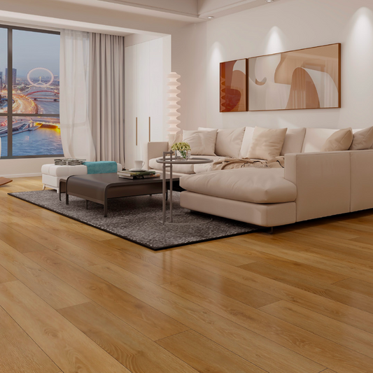 Modern living room with a beige sofa, coffee table, and cityscape view.