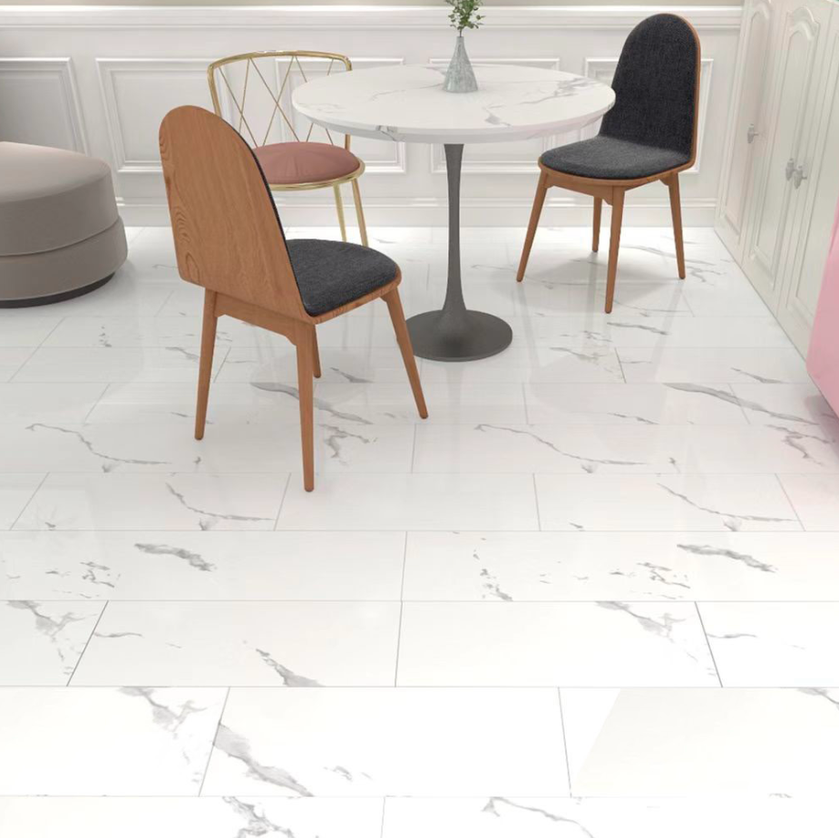 Modern interior with chairs, table, and sofa on a marble floor.
